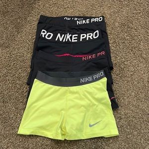 4 pairs of Nike Pro Spandex